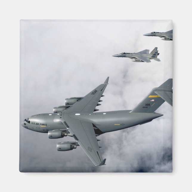 F-15B Eagles escort the first Hawaii-based C-17 Magnet (Front)