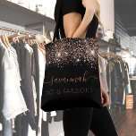 Fabulous birthday black rose gold glitter monogram tote bag<br><div class="desc">For a trendy and glamorous 50th (or any age) birthday. A chic black background decorated with rose gold glitter drops. With the text: 50 and fabulous. Personalize and add a name. Rose gold colored text. The name is written with a modern hand lettered style script with swashes. To keep the...</div>