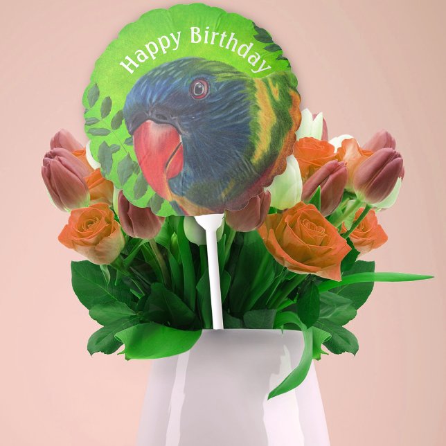 Face of colourful Macaw Parrot Leaves Birthday Balloon (Face of macaw parrot with colourful feathers and leaves on green on Happy Birthday mylar balloon.)