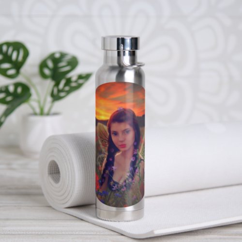 Fairy at Sunset in a field of poppies Fantasy Art Water Bottle