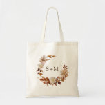 Fall Bride Groom Monogram Leaves Wreath Wedding Tote Bag<br><div class="desc">This elegant fall wedding tote bag features hand-painted watercolor burnt orange and terracotta leaves, cream and beige dahlias, and beautiful rust-colored roses perfect for an autumn wedding! The back and front have the same design. (This design is part of the Autumn Romance collection that can be viewed by clicking on...</div>
