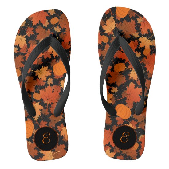 Fall colors maple leaves and pumpkins pattern flip flops