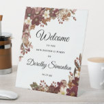 Fall Flowers 90th Birthday Party Welcome Pedestal Sign<br><div class="desc">Welcome guests to your 90th birthday party with this elegant fall floral welcome sign. Two pretty arrangements of burgundy red flowers, mauve pink wildflowers and white florals decorate the sign. Welcome and the birthday celebrant's name are written in a large trending script font. The remainder of the text is a...</div>