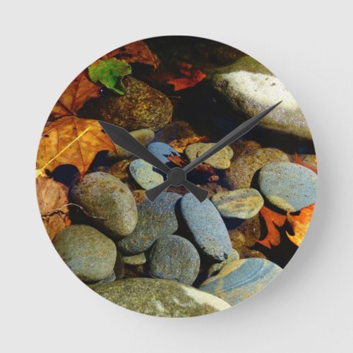 Fall leaf with Rocks in mountain creek Round Clock