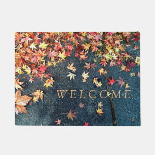 Fall leaves on pavement doormat