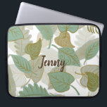 Falling Leaves Laptop Sleeve<br><div class="desc">Stylish personalized laptop sleeve,  with graphics of a green,  brown,  and white leaves pattern.  Personalize the custom text for yourself or as a lovely gift idea.</div>