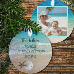 Family Christmas Beach Shells Photo Ornament<br><div class="desc">Family beach vacation keepsake ornament for the Christmas tree.  Tropical blue ocean water and beach sand with shells is the design on this round ornament.  Customize with text on one side and a photo on the other.  Starfish and and a sand dollar decorate the front.</div>