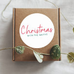 Family Christmas | Modern Minimalist Family Name Classic Round Sticker<br><div class="desc">Simple,  stylish "Christmas with the <your name="">" quote stickers in modern minimalist typography in festive red and green. The design can be easily personalized with your family name(s),  year or own special greeting for super cute bespoke holiday vibes!</your></div>