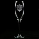 Family Crest Monogrammed Champagne Flute<br><div class="desc">Our family crest design features a deeply carved initial and border. Pick first or last initials for groomsmen, bridesmaids, friends, or family. Our glasses are perfect for the home bar, basement bar, man cave, or executive office. They make thoughtful and memorable gifts for weddings, anniversaries, promotions, retirements, graduations, or birthdays....</div>