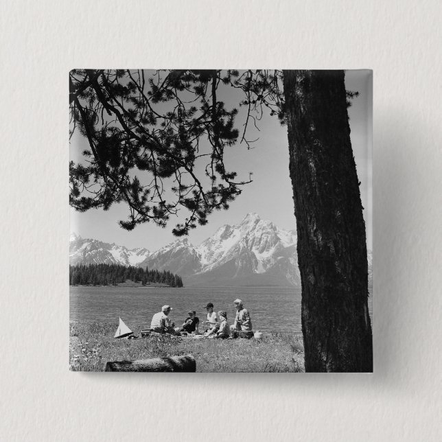 Family having picnic by lake mountains button (Front)