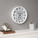 Family Lake House Oars Fish White Plaid Clock<br><div class="desc">A beautiful, rustic themed wall clock with your personalized family name, lake house, fishing cabin or other desired text and it's established date. This custom design features rustic style typography with artwork of a fish and boat oars and framed in a white plaid style print with shades of soft gray....</div>