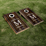 Family Monogram Dark Wood Cornhole Set<br><div class="desc">A unique corn hole set featuring your family monogram and name over a faux dark wood backdrop. ******* To change the center monograms use the customization function/edit this design button. It should take you to a design space where you can edit and also resize the monogram letter for each board...</div>
