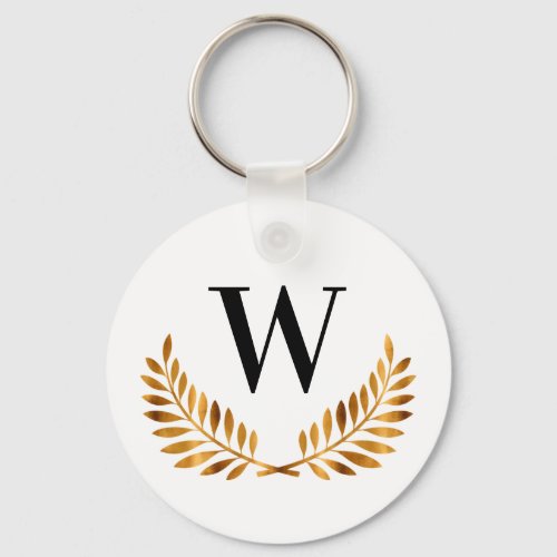Family monogram name gold black laurel wreath keychain
