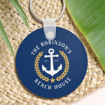Family Name Beach House Anchor Gold Laurel Navy Keychain<br><div class="desc">A stylish nautical themed Keychain with your personalized family name and beach house, lake house, or other desired text with its established date. Features a custom designed boat anchor with gold style laurel leaves and a star on navy blue or easily customize the base color to match your current decor...</div>