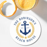 Family Name Beach House Anchor Gold Laurel White Round Paper Coaster<br><div class="desc">A stylish nautical themed set of paper coasters with your personalized family name and beach house, lake house, or other desired text and established date. Features a custom designed boat anchor with gold style laurel leaves and a star on white or easily customize the base color to match your current...</div>