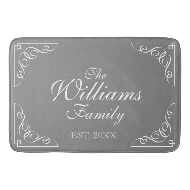 Family Name Est. gray bath mat with elegant swirls (Front)