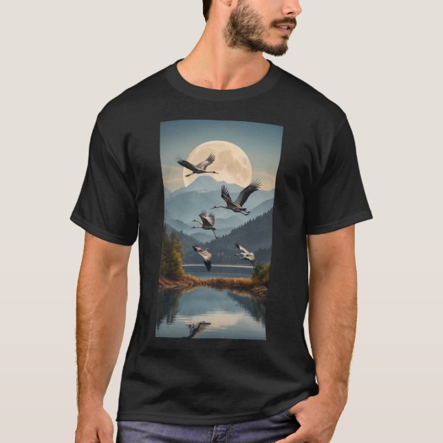 Family of cranes flying over a lake with mountains T-Shirt (Front)