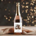 Family Photo & Merry and Bright Minimalistic  Wine Label<br><div class="desc">Make your holiday celebrations extra special with our Family Photo & Merry and Bright Minimalistic Christmas Wine Label. Featuring a clean, modern design with "Merry and Bright" and a space for your favorite family photo, this personalized wine label adds a unique and festive touch to your wine bottles. Perfect for...</div>