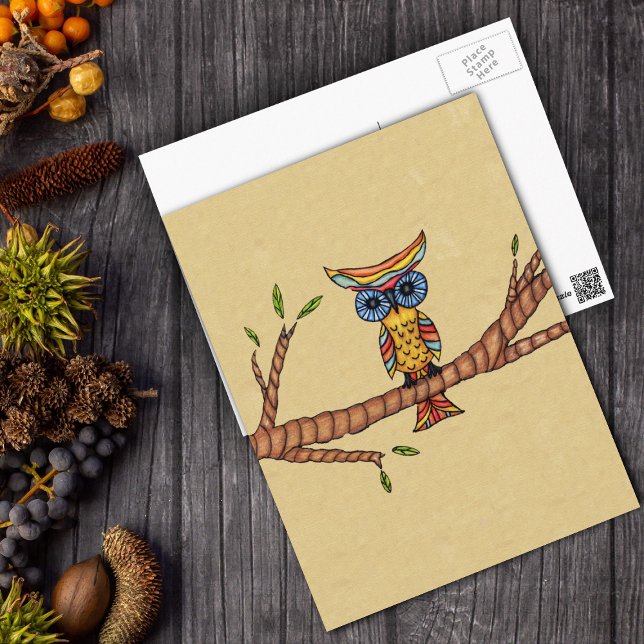 Fancy Colorful Owl Branch Postcard (Fantasy colourful owl blue eyes sitting on tree branch on tan postcard.)