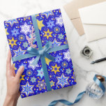 Fancy Stars of David Wrapping Paper<br><div class="desc">Colorfully patterned Stars of David dance on a field of deep blue.</div>
