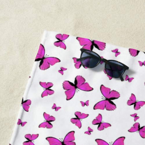 Fantasy pink butterflies  beach towel