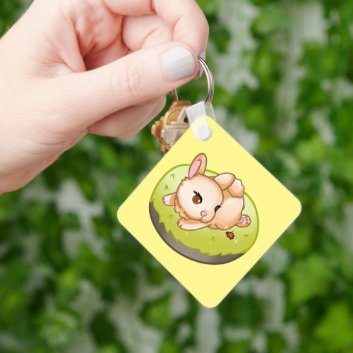 farm bunny lying down sunbathing and playing  keychain