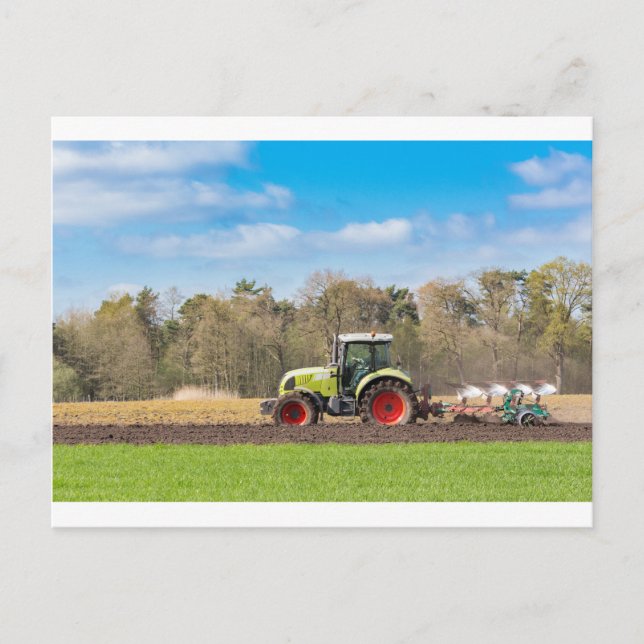 Farmer on tractor plowing sandy soil in spring postcard (Front)