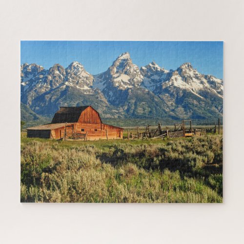 Farms  Barn Shadowed by Snow Capped Mountains Jigsaw Puzzle