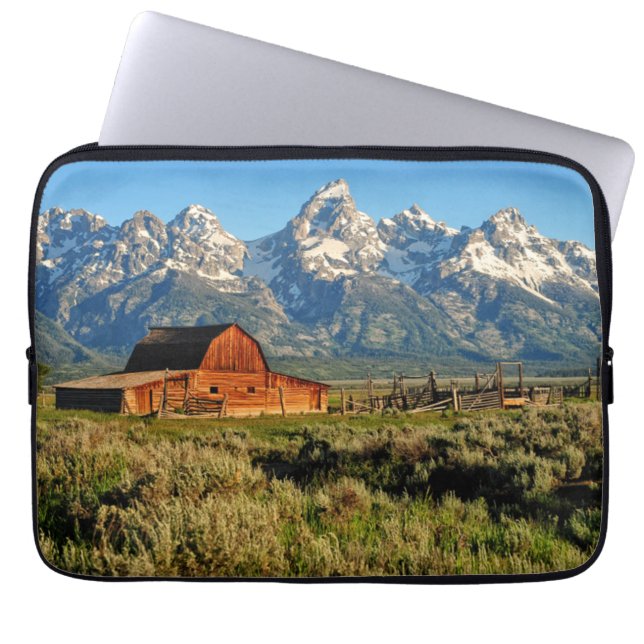 Farms | Barn Shadowed by Snow Capped Mountains Laptop Sleeve (Front)