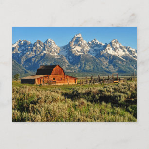 Farms Barn Shadowed by Snow Capped Mountains Postcard