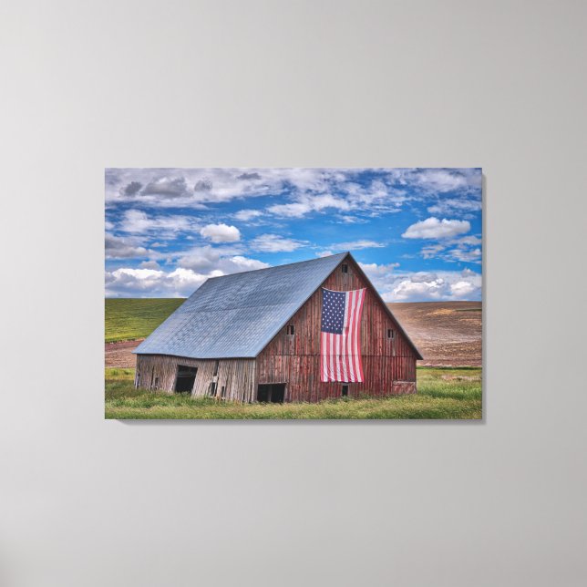 Farms | Rustic Red Barn With American Flag Canvas Print (Front)