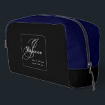 Father Of Bride Gift Elegant Monogram Chic Black Dopp Kit<br><div class="desc">Parents Gifts Father Of The Bride Gift Elegant Monogram Chic Script Personalized Father's Name And Initial Cool Black And Navy Blue Dopp Kit Or Men's Toiletries Travel Bag. Click personalize this template to customize it with the monogram initial, the name, and the date quickly and easily. Father Of Bride Gift...</div>