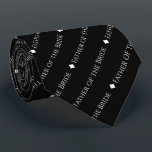 Father of the Bride Repeating White Text on Black Neck Tie<br><div class="desc">This black neck tie is the perfect accessory for the father of the bride at your wedding. It features a simple yet elegant repeating text design with the word "Father of the Bride" written in a sophisticated all capital white font. There are small diamonds separating the text, giving the tie...</div>