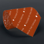 Father of the Groom Repeating Text Rust Orange Neck Tie<br><div class="desc">This fun rust orange or burnt umber colored neck tie is the perfect accessory for the father of the groom at your wedding. It features a simple yet elegant design with the word "Father of the Groom" written in a sophisticated all capital white font, and repeating in a diagonal pattern...</div>