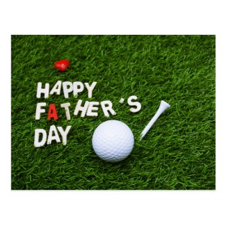 Father's day with golf ball on green postcard