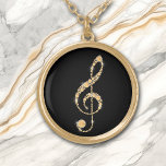 Faux Amber Diamond Treble Clef on Black Music Gold Plated Necklace<br><div class="desc">Stunningly beautiful is this necklace that features a faux gold amber diamond formed treble clef. The image is placed on a black background for dramatic effect,  but you may easily change the background color by customizing it. Perfect for the music student,  teacher,  or performer! *Design credit to ThingsByLary.</div>