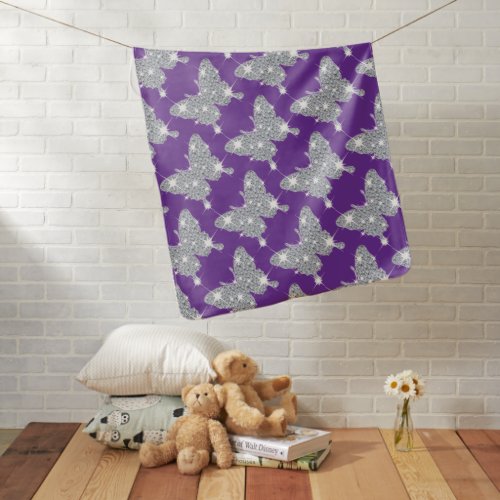 Faux diamond sparkle butterfly pattern on purple baby blanket