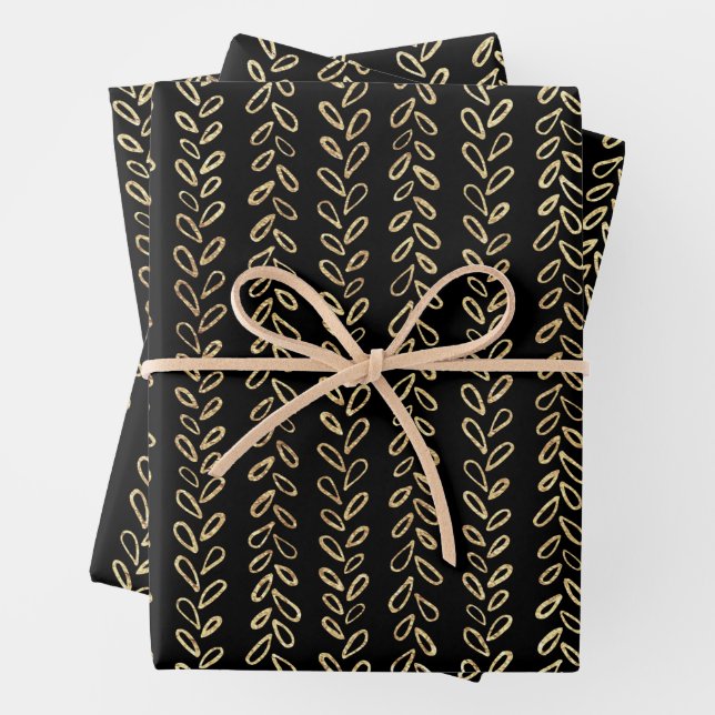Faux gold and black pattern wrapping paper sheets (In situ)