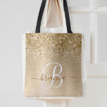 Faux Gold Brushed Metal Glitter Print Monogram Nam Tote Bag<br><div class="desc">Easily personalize this trendy chic tote bag design featuring pretty gold sparkling glitter on a gold brushed metallic background.</div>
