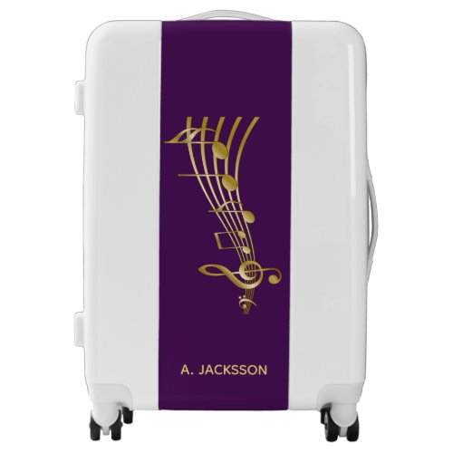 Faux gold music notes on chic purple suitcase