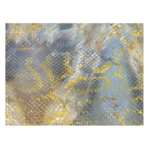 Faux gold snake skin texture on marble tablecloth