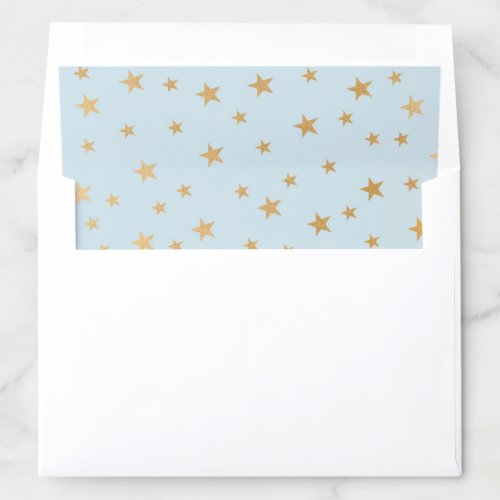 Faux gold stars on blue background envelope liner