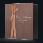 Faux Suede Binder with ribbon Wedding album<br><div class="desc">Photographic brown Faux Suede Binder with faux tangerine ribbon Wedding binder. you can alter the text or text color as you wish!</div>