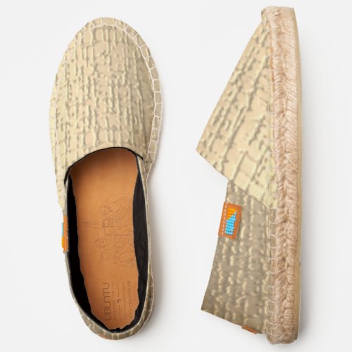 faux textured gold color pattern with black liner espadrilles