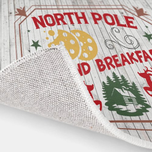 faux wood North Pole Bed Breakfast Christmas Rug