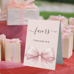 Favor sign pink bow<br><div class="desc">Pink background,  decorated with a large bow.  Text: Favors. Please take one!</div>