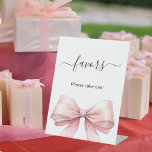 Favor sign pink bow white<br><div class="desc">White elegant background,  decorated with a large pink bow.  Text: Favors. Please take one!</div>