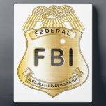 FBI Badge Plaque<br><div class="desc">A gold FBI badge isolatrd over a white background</div>