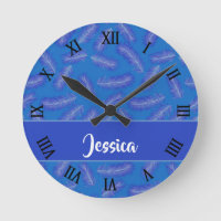 Feathers on blue pattern round clock