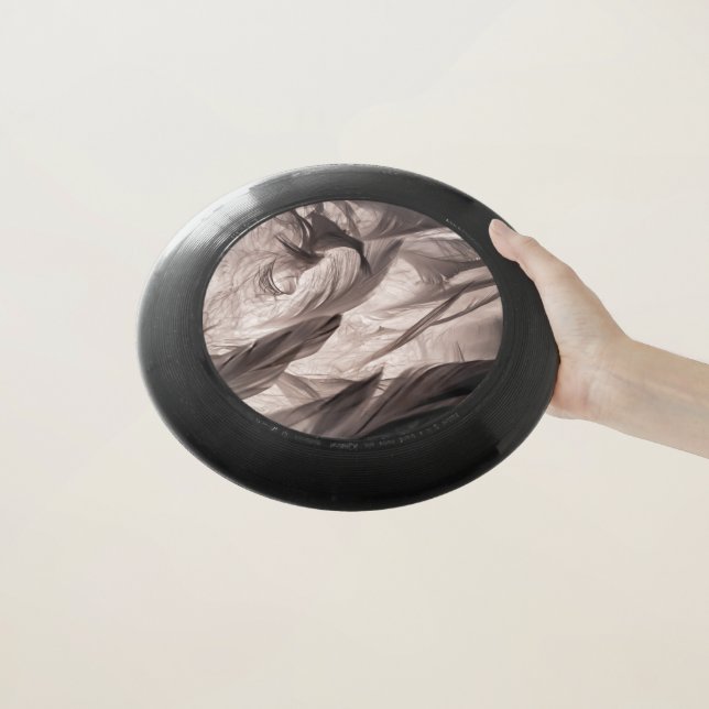 Feathers Wham-O Frisbee (In Hand)